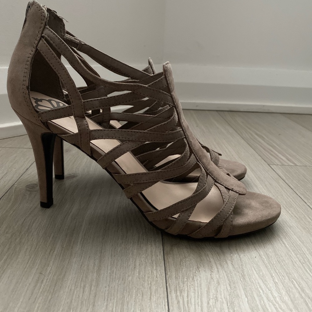 Beautiful strappy heels with zipper at the back.